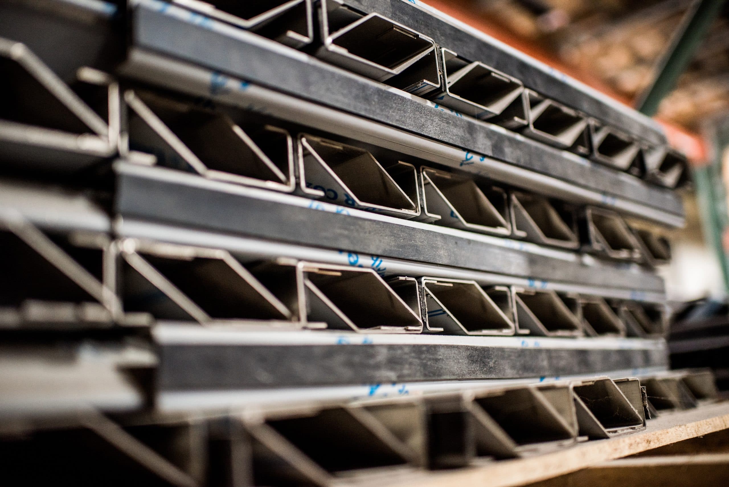 Stacked OEM metal parts ready for production use by KPI Concepts